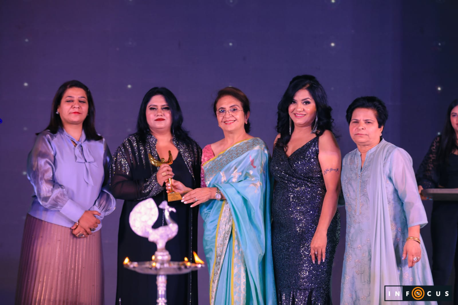 Receiving an award for social work
